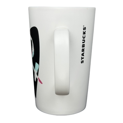 Rare Starbucks XOXO mug featuring a sleek design and comfortable handle for coffee lovers