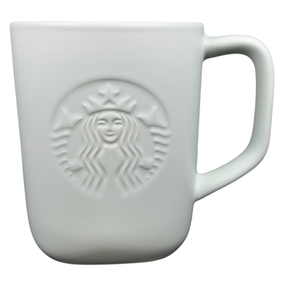 Elegant recycled ceramic Starbucks mug featuring embossed logo and comfortable handle