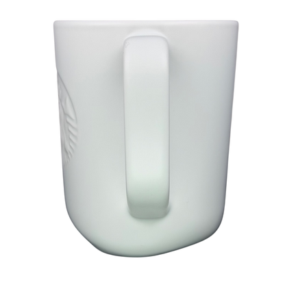 Side view of a recycled ceramic Starbucks mug showcasing a sleek design and comfortable handle