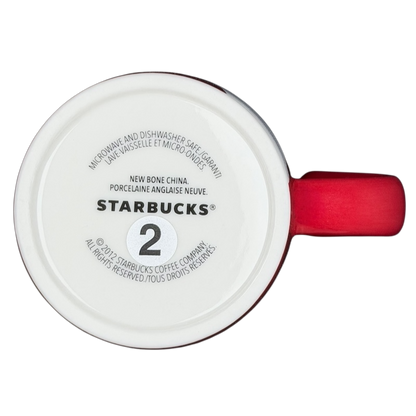Bottom view of a Starbucks Red Fox tail handle Mug 2012 showing dishwasher safe details