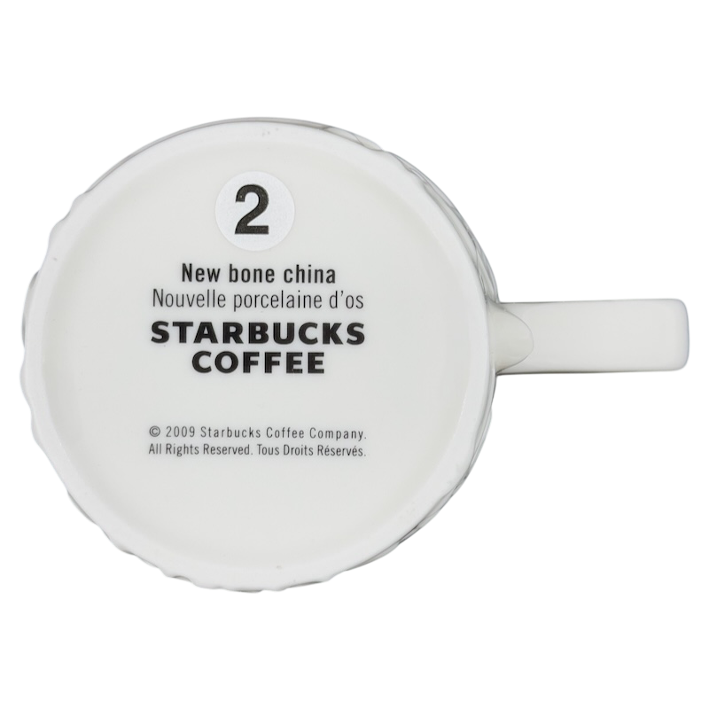 Bottom view of a Reindeer Mug Starbucks showcasing new bone china material and brand details