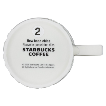Bottom view of a Reindeer Mug Starbucks showcasing new bone china material and brand details