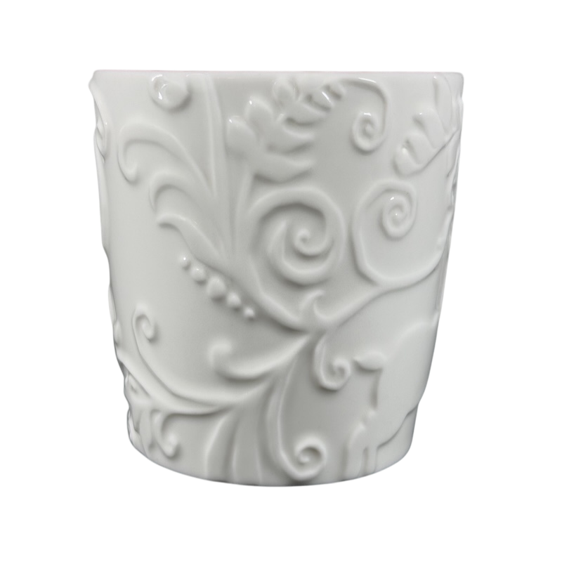 Elegant white Reindeer Mug Starbucks with intricate embossed design suitable for holiday beverages