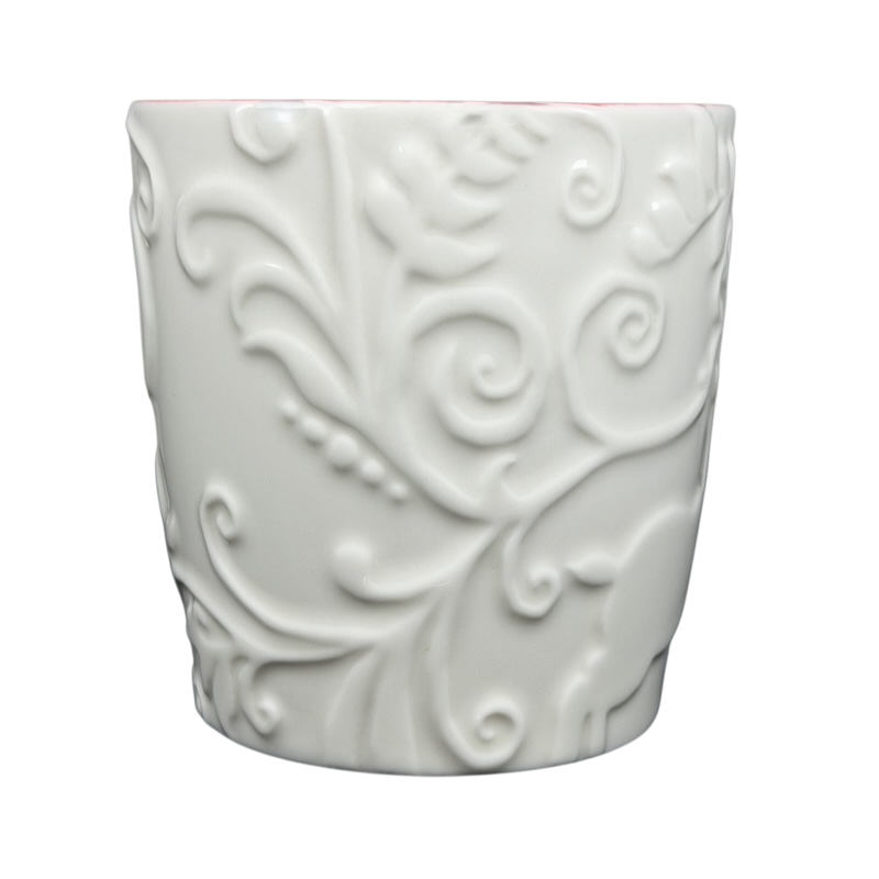 White Reindeer Mug Starbucks with intricate embossed swirls and festive design for holiday drinks