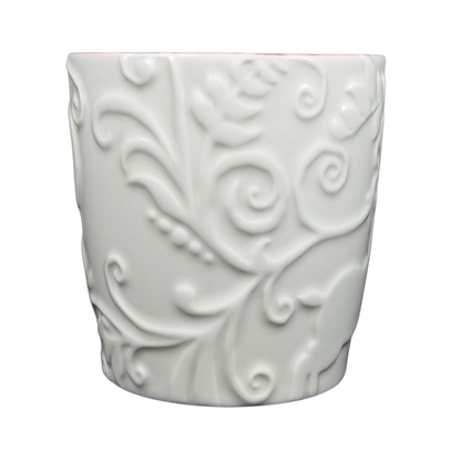 White Reindeer Mug Starbucks with intricate embossed swirls and festive design for holiday drinks