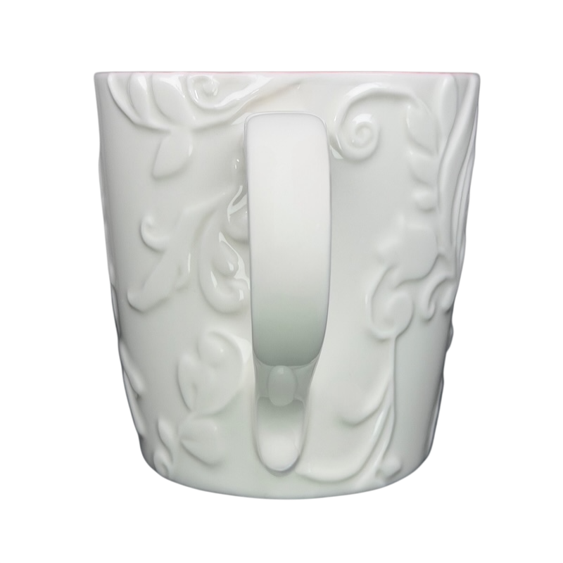 Elegant white Reindeer Mug Starbucks with intricate embossed design and cozy holiday spirit