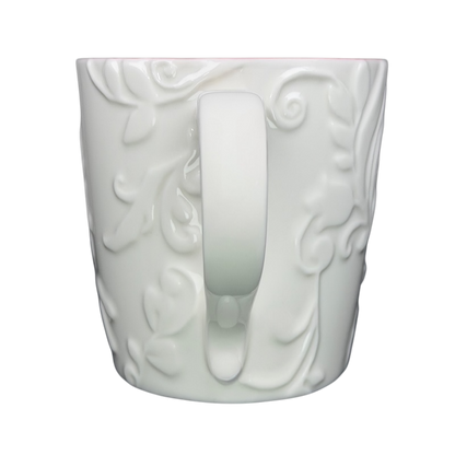 Elegant white Reindeer Mug Starbucks with intricate embossed design and cozy holiday spirit
