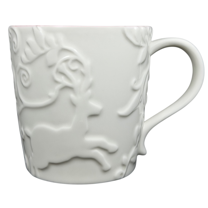 Reindeer Mug Starbucks featuring an elegant embossed reindeer design and a classic white finish
