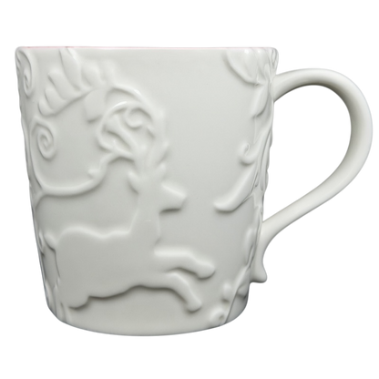 Reindeer Mug Starbucks featuring an elegant embossed reindeer design and a classic white finish