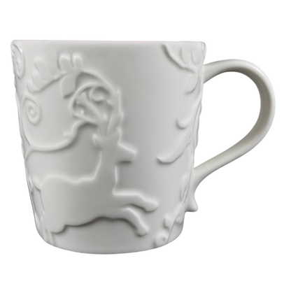 White Reindeer Mug Starbucks featuring intricate embossed reindeer design for holiday enjoyment