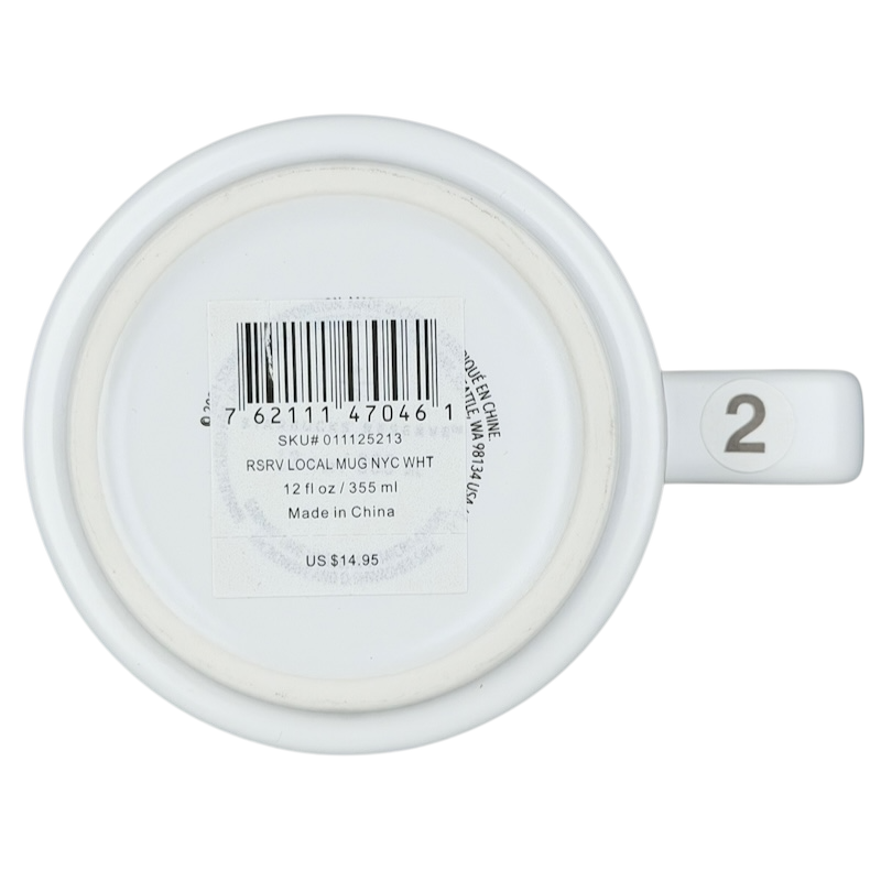 Top view of a Starbucks Reserve Roastery NYC mug in white, featuring a barcode and product details