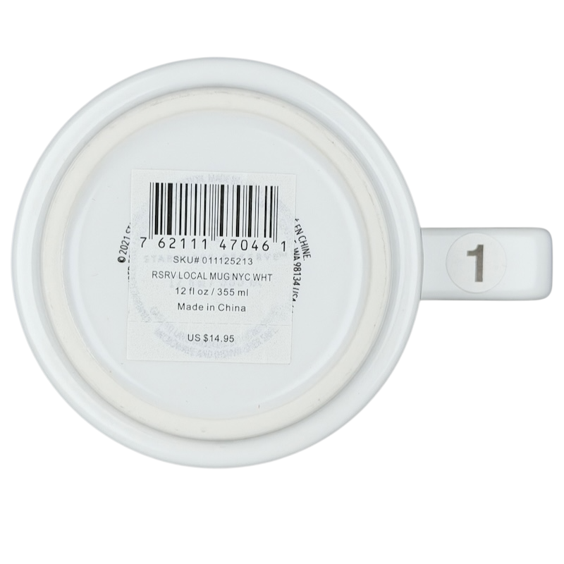 Bottom view of a white Starbucks Reserve Roastery NYC mug with a barcode and size indication