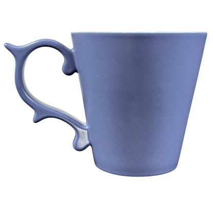 Starbucks Rococo Slate Blue collectible mug with a unique handle design for stylish sipping