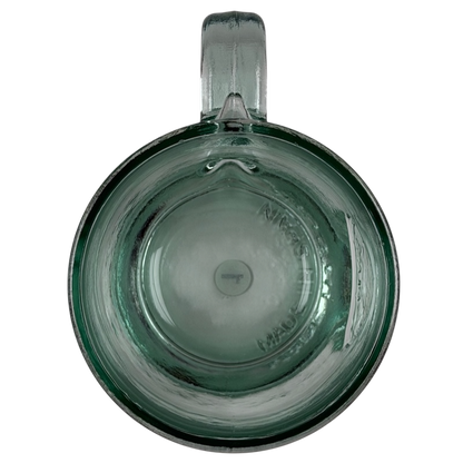 Starbucks San Miguel recycled green glass mug with a smooth finish and handle, viewed from above