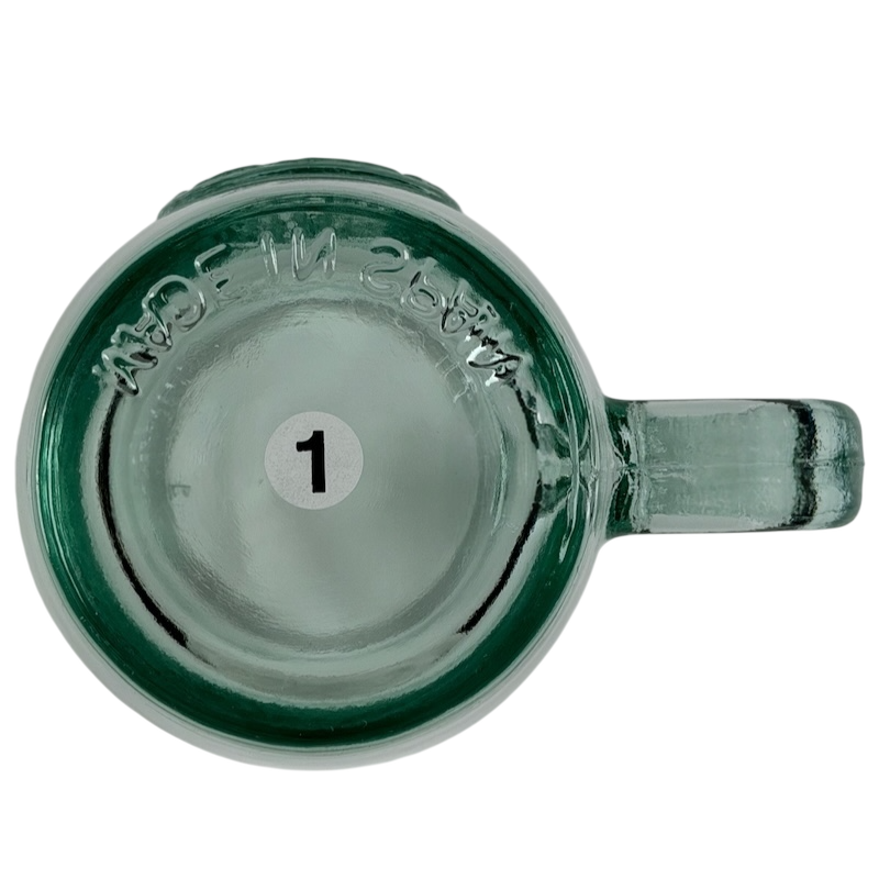 Starbucks San Miguel recycled green glass mug with a sleek handle and minimalist design
