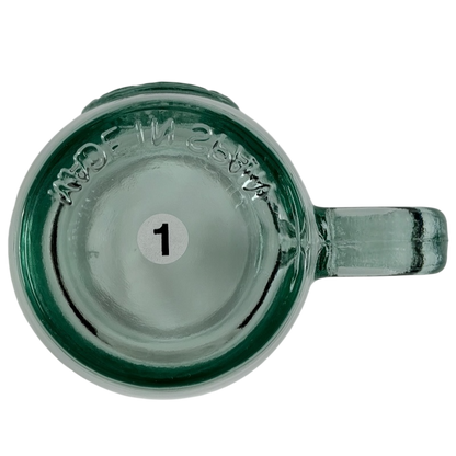 Starbucks San Miguel recycled green glass mug with a sleek handle and minimalist design