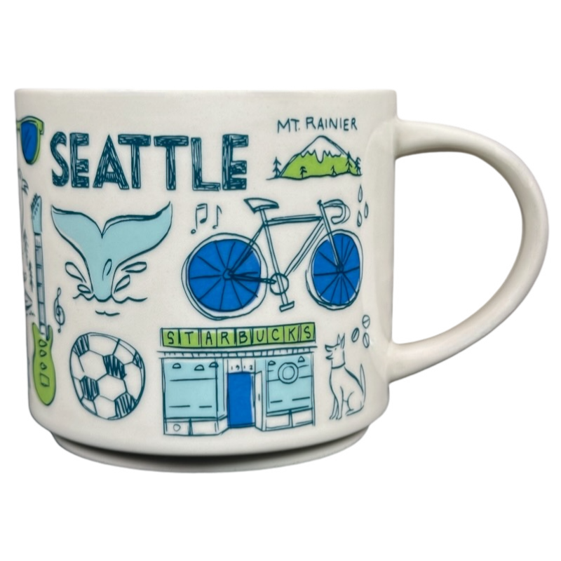 Seattle Starbucks Been There mug with colorful city-themed illustrations including Mt. Rainier bike and whale tail