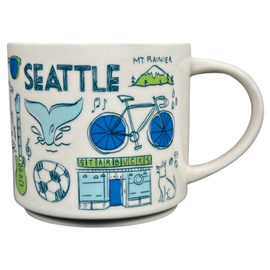 Seattle Starbucks Been There mug with colorful city-themed illustrations including Mt. Rainier bike and whale tail