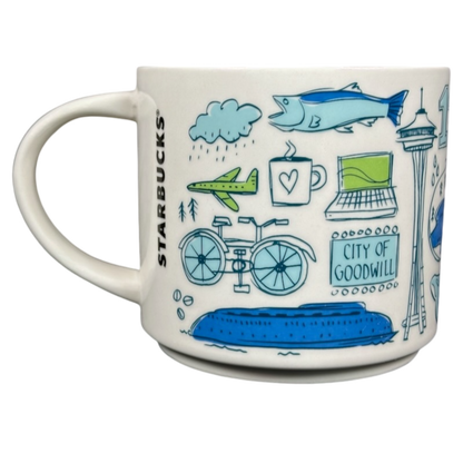 White ceramic Seattle Starbucks Been There mug with blue and green city-themed illustrations