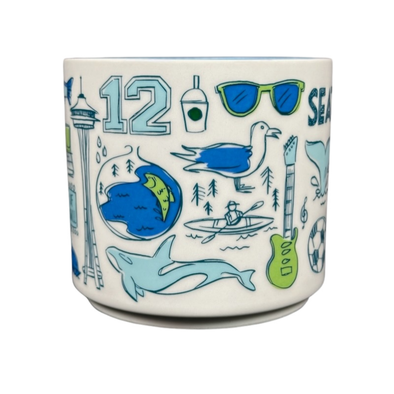 Seattle Starbucks Been There mug featuring iconic Seattle landmarks and symbols in blue and green