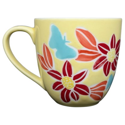 Starbucks spring butterfly vintage mug featuring vibrant flowers and a butterfly design