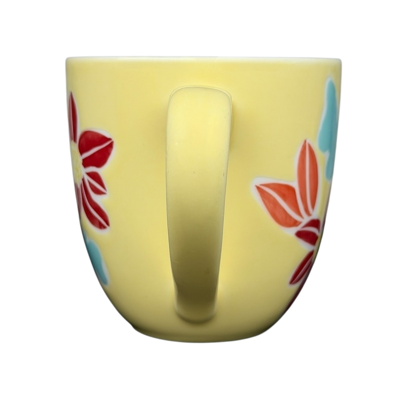 Starbucks spring butterfly vintage mug in yellow with floral designs for seasonal beverages