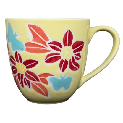 Starbucks spring butterfly vintage mug featuring colorful floral and butterfly designs on a yellow background