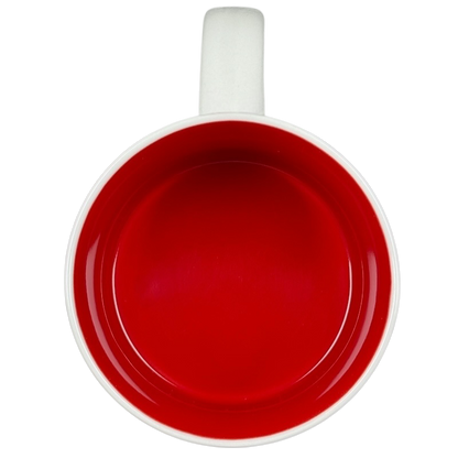 Overhead view of Starbucks New Jersey You Are Here collectible mug with glossy red interior and white handle on black background