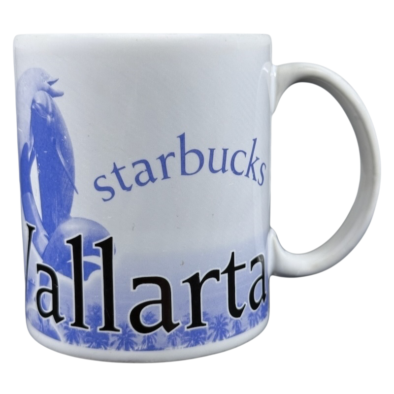 White ceramic Starbucks Puerto Vallarta vintage mug with blue Vallarta text and dolphin artwork
