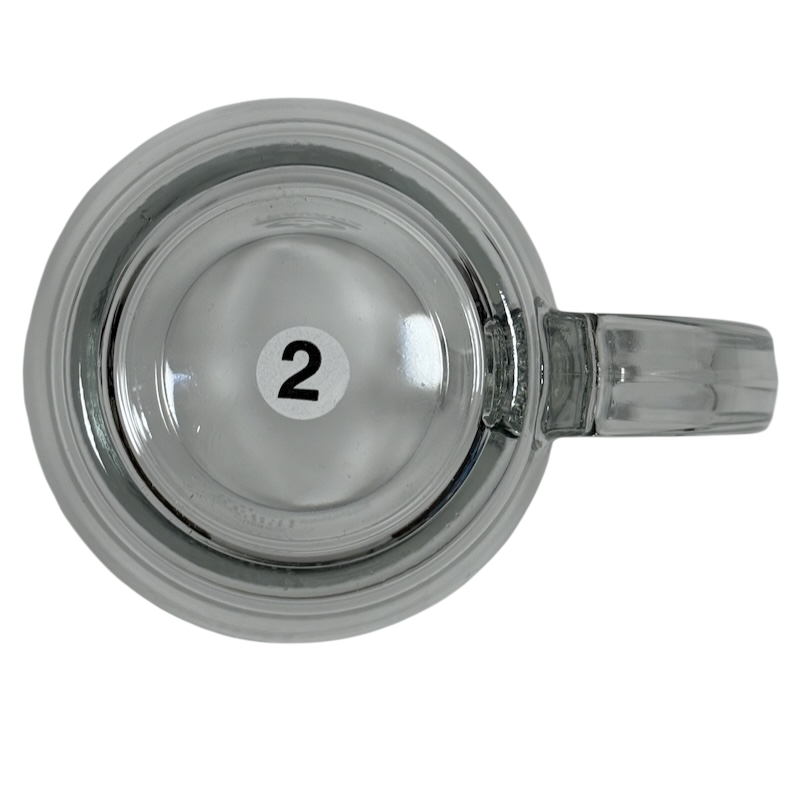 Top view of clear Starbucks Teavana Come Let Us Have Some Tea glass mug with handle and numbered sticker 2