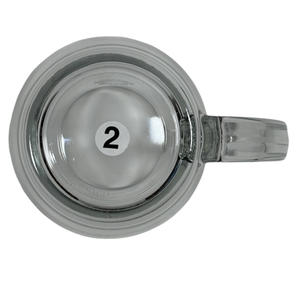 Top view of clear Starbucks Teavana Come Let Us Have Some Tea glass mug with handle and numbered sticker 2