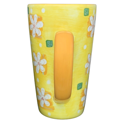 Cheerful yellow Summer Daisy Latte Mug Starbucks with floral design and a comfortable handle