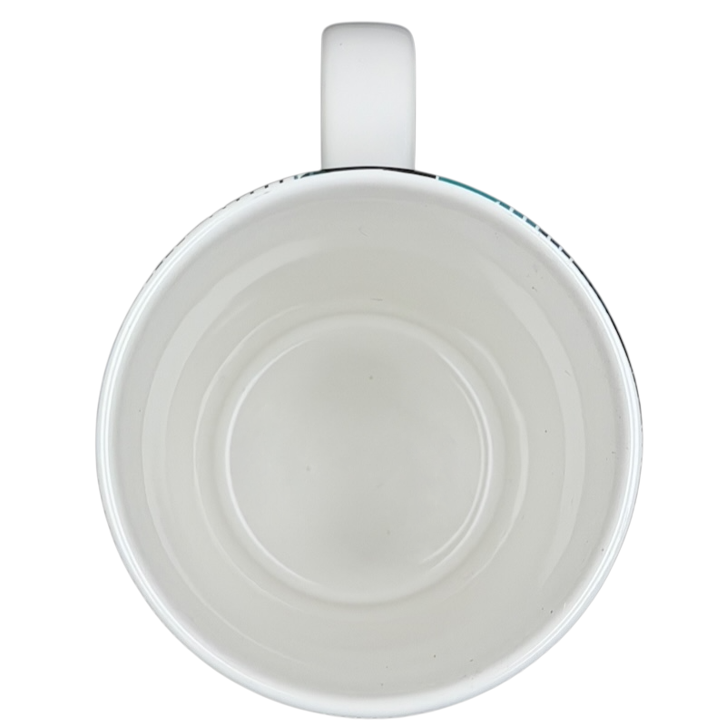 Inside view of a teal plaid Starbucks siren collectible mug showing the smooth, glossy finish