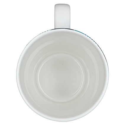 Inside view of a teal plaid Starbucks siren collectible mug showing the smooth, glossy finish