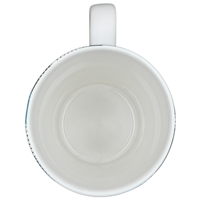 Inside view of teal plaid Starbucks siren collectible mug showcasing a smooth surface and elegant design