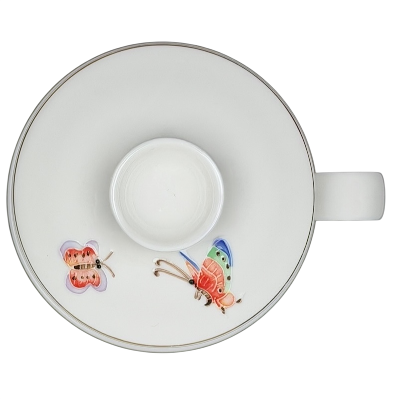 Top view of Enchanted Butterfly Mug Starbucks Teavana featuring colorful butterfly designs