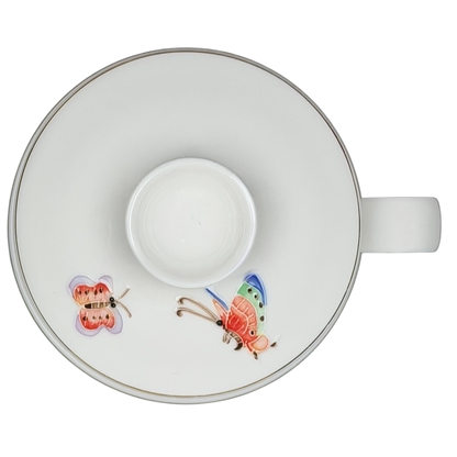 Top view of Enchanted Butterfly Mug Starbucks Teavana featuring colorful butterfly designs