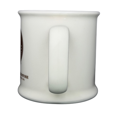 White ceramic mug featuring The First Starbucks Store Pike Place Market Seattle WA design for coffee lovers