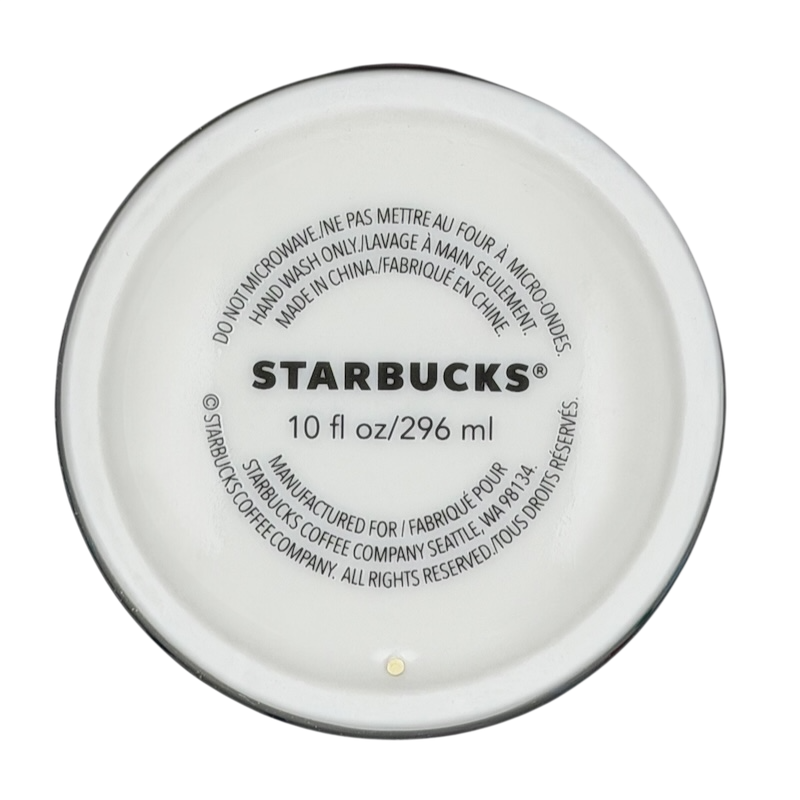 Bottom view of Starbucks Valentine's Day embossed heart tumbler with care instructions and capacity details