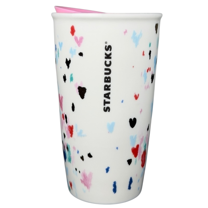 Starbucks Valentine's Day embossed heart tumbler in white with colorful heart designs and pink lid