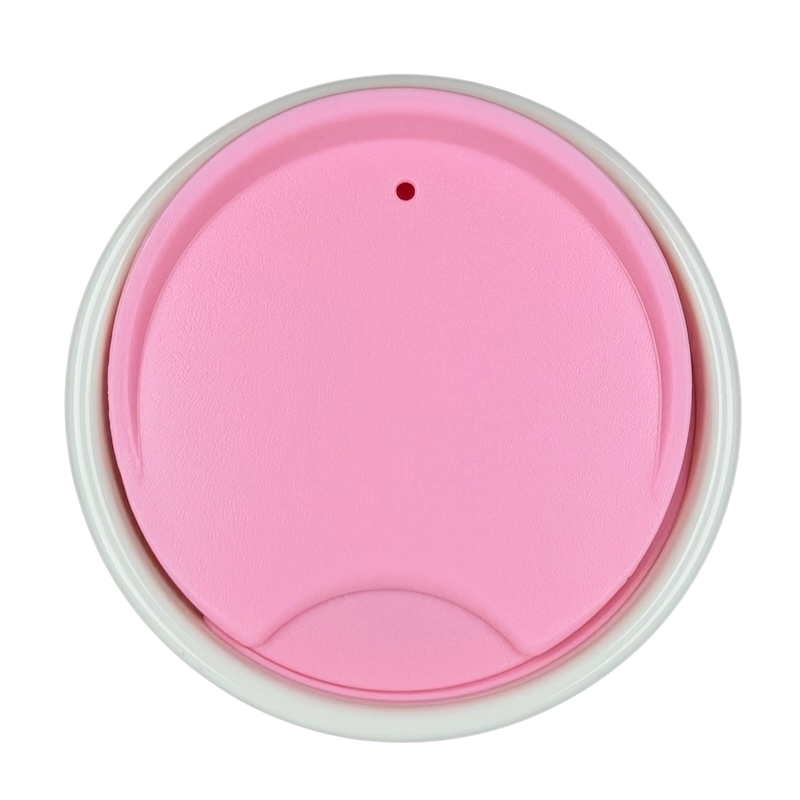 Starbucks Valentine's Day embossed heart tumbler lid in pink with a small opening for sipping