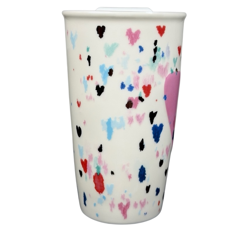 Starbucks Valentine's Day embossed heart tumbler with colorful heart patterns for festive drinks