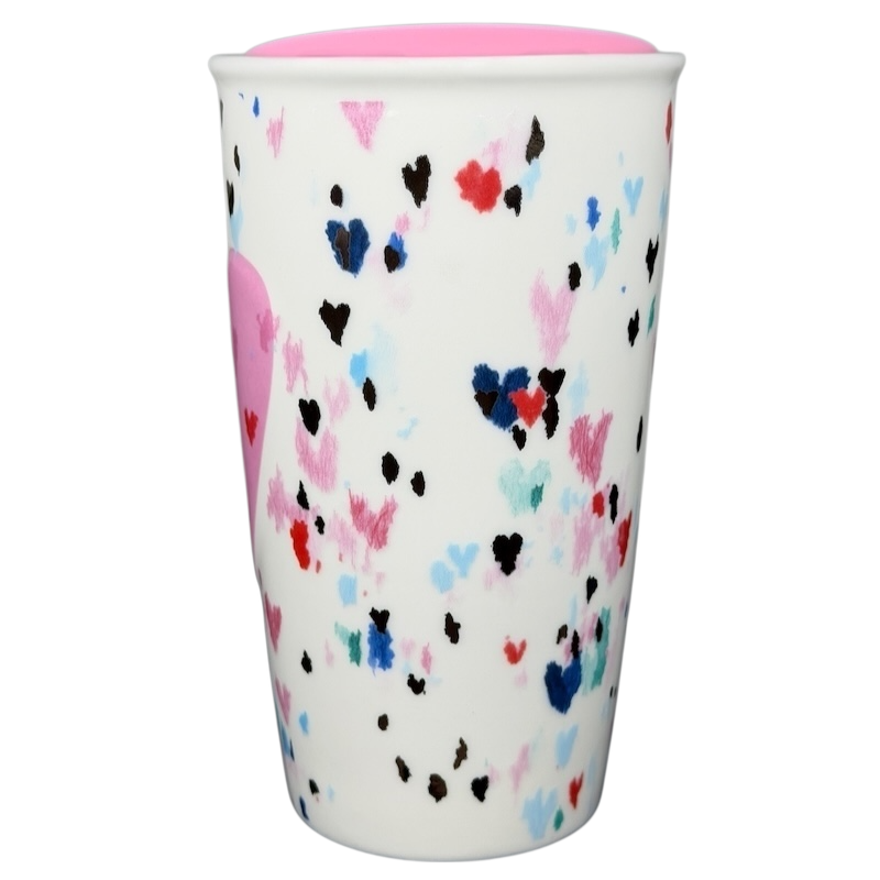 Starbucks Valentine's Day embossed heart tumbler with colorful heart patterns on a white background