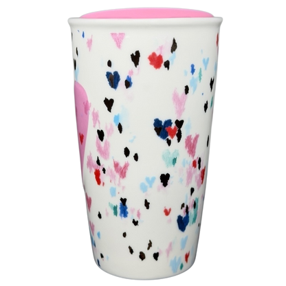 Starbucks Valentine's Day embossed heart tumbler with colorful heart patterns on a white background