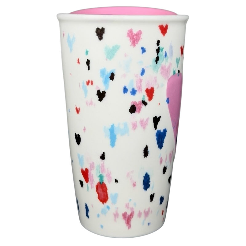 Starbucks Valentine's Day embossed heart tumbler with colorful heart designs on a white background