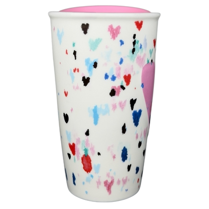 Starbucks Valentine's Day embossed heart tumbler with colorful heart designs on a white background