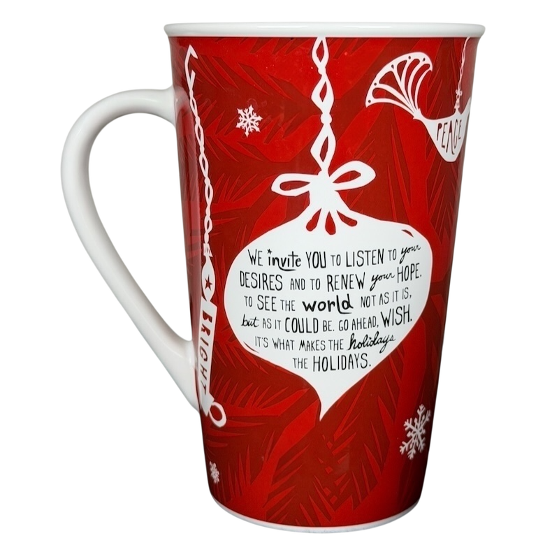 Vintage 2009 Starbucks holiday mug featuring festive red design and inspirational holiday message