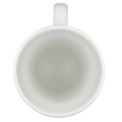 Interior view of a vintage 2009 Starbucks holiday mug showcasing its smooth, white ceramic design