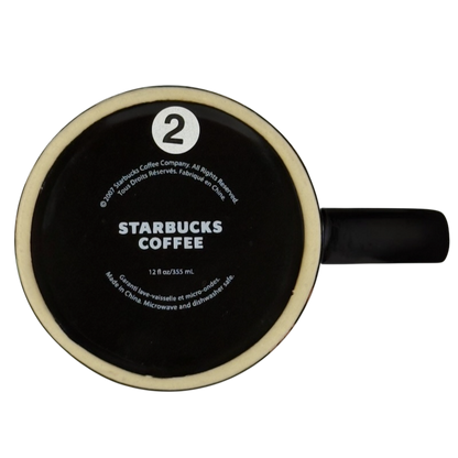 Bottom view of vintage Starbucks Halloween pumpkin mug showing Starbucks Coffee logo and 12 fl oz marking