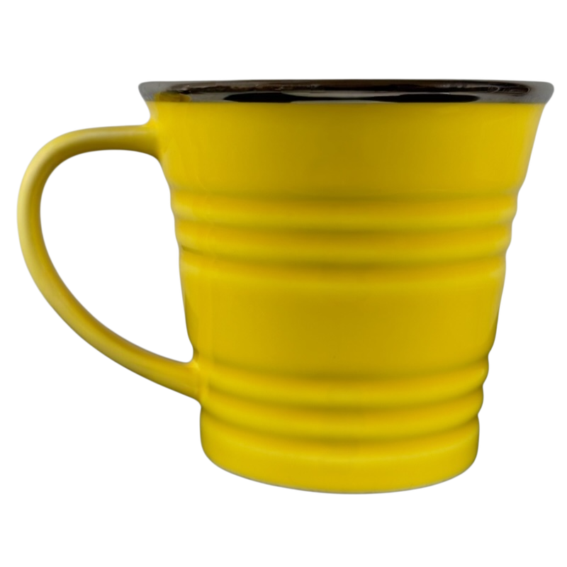 Vintage Starbucks yellow sand pail mug with ridged design and large handle